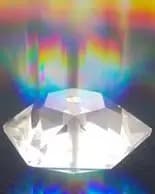 Natural faceted gemstone with light refraction